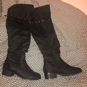 Black High Boots with zipper and adjustable tie.